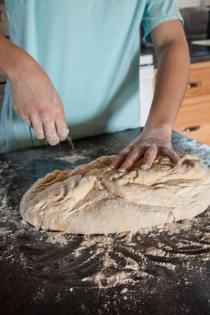 food, bread, baking, dough, ingredients, fresh, healthy, wheat, baked, pastry, flour, meal, grain, homemade, eating, kitchen, cook, cooking, brown, nutrition, tasty, work, hands, delicious, culinary, knead, kneading, home, preparing, recipe, baker, caucasian, skill, white